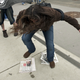 A woman celebrates by stomping on a photo of bin Laden. (Don Emmert/Getty Images)